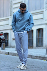 sweatshirt oversize à capuche et poche kangourou pour homme en bleu clair