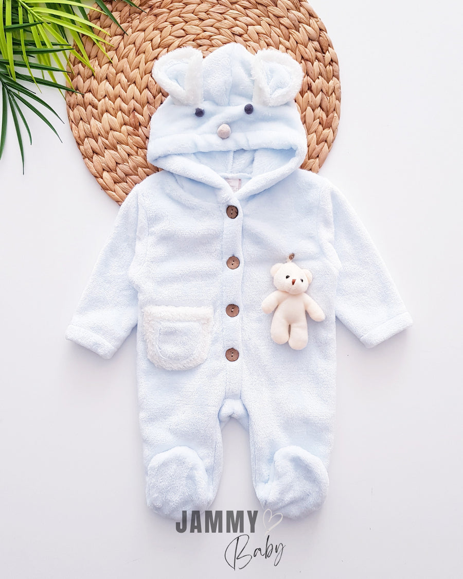 <tc>Combinaison en peluche avec ourson en jouet</tc>