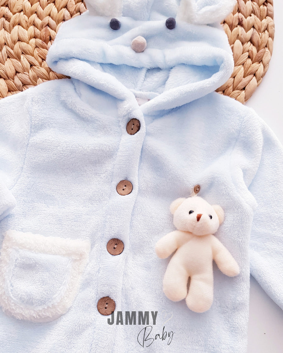 <tc>Combinaison en peluche avec ourson en jouet</tc>