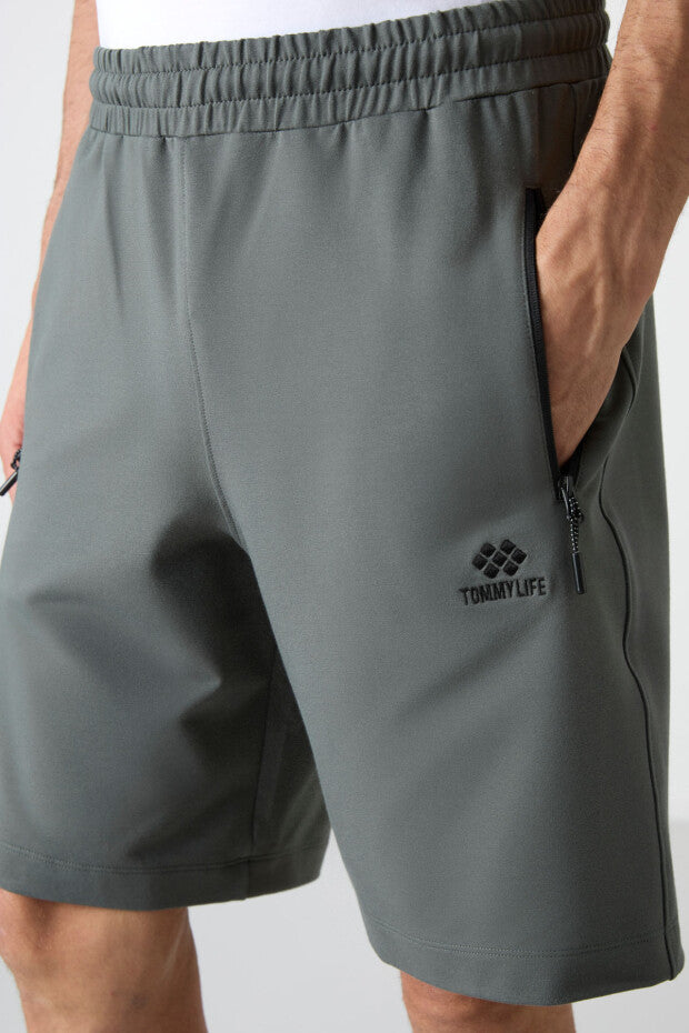 Short homme à cordon avec poche arrière zippée – coupe standard sportive - 81136