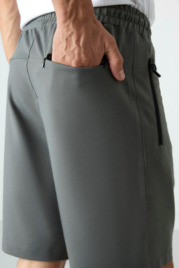 Short homme à cordon avec poche arrière zippée – coupe standard sportive - 81136