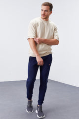 <tc>Pantalon de survêtement jogger homme coupe standard avec poches zippées - 84651</tc>