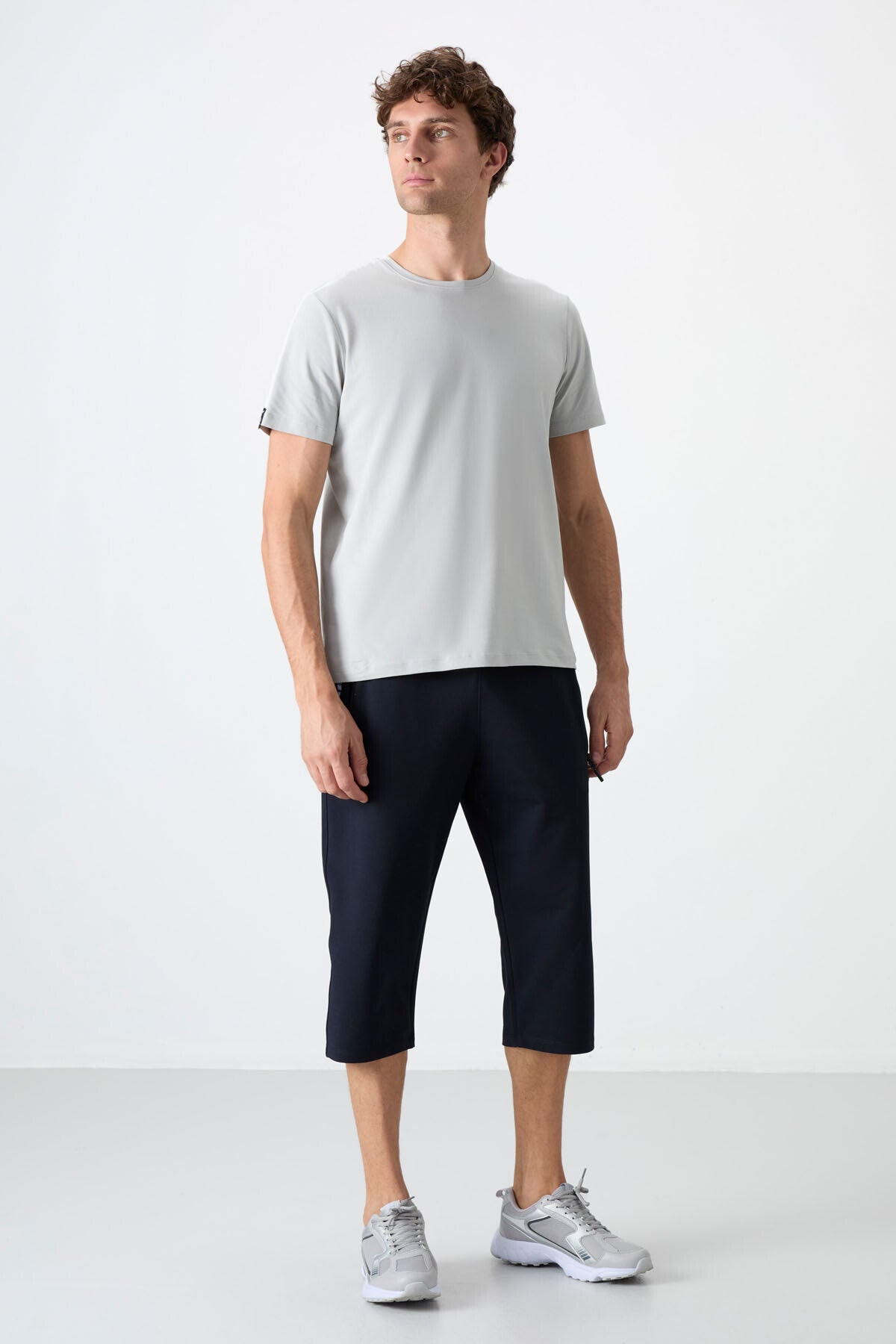 <tc>Capri homme coupe standard avec poches zippées et jambes classiques - 83091</tc>