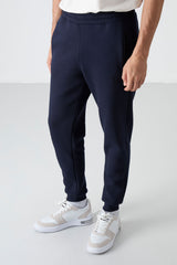 <tc>Pantalon de survêtement homme Cesar avec poches, molletonné - 84929</tc>