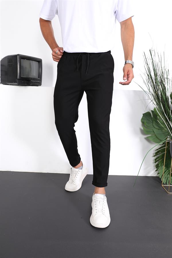 <tc>Pantalon ajusté à double ourlet avec texture premium.</tc>