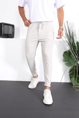 <tc>Pantalon ajusté à double ourlet avec texture premium.</tc>