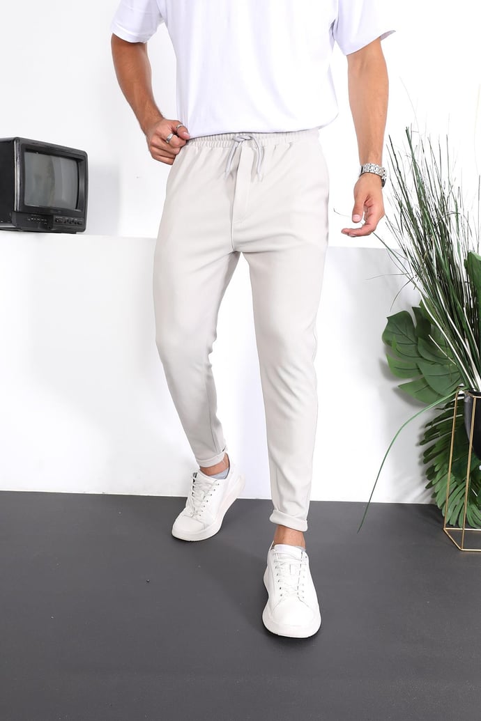 <tc>Pantalon fit à double jambe avec texture premium.</tc>