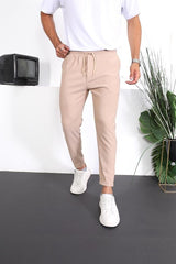 <tc>Pantalon ajusté à double ourlet avec texture premium.</tc>