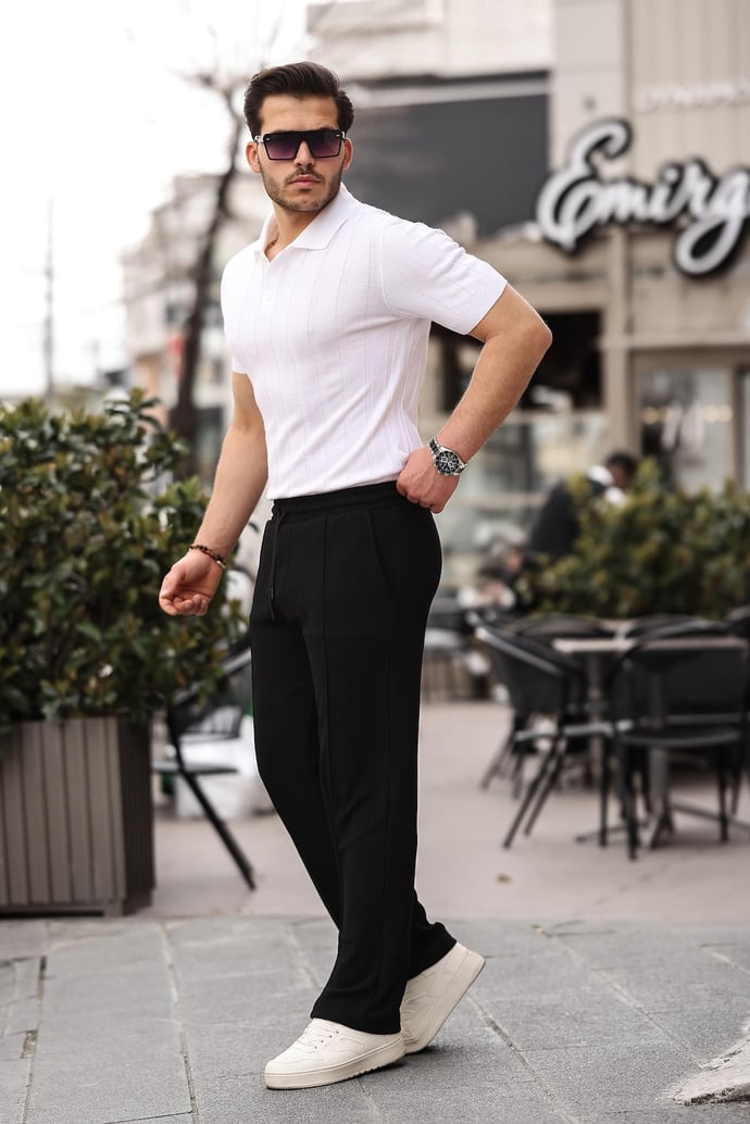 <tc>Pantalon baggy à taille élastique, coupe décontractée.</tc>