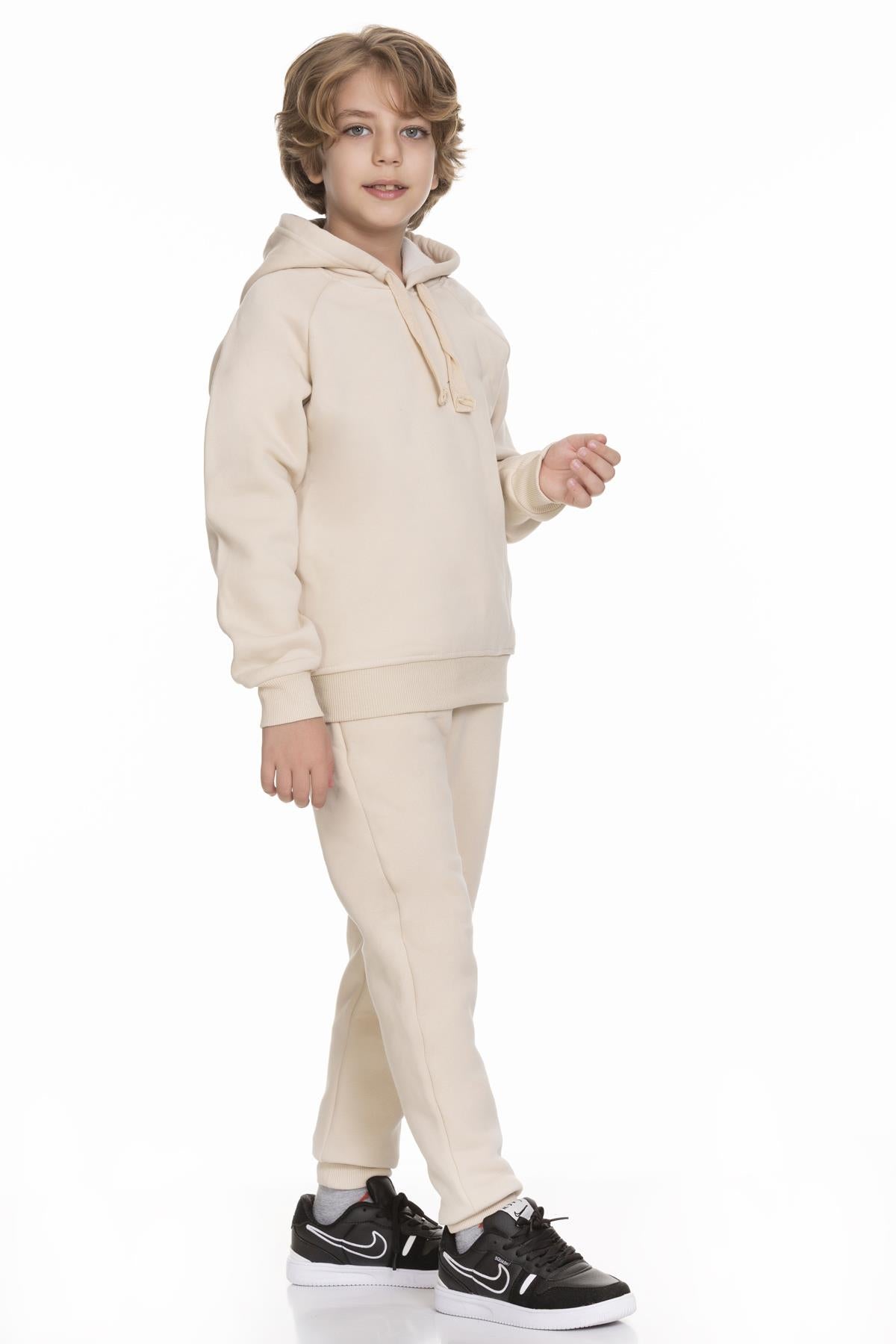 <tc>Ensemble unisexe pour enfant avec manches raglan, capuche et intérieur en polaire</tc>