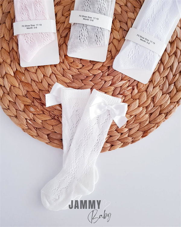 <tc>Chaussettes golf pour bébé Selvin en filet</tc>