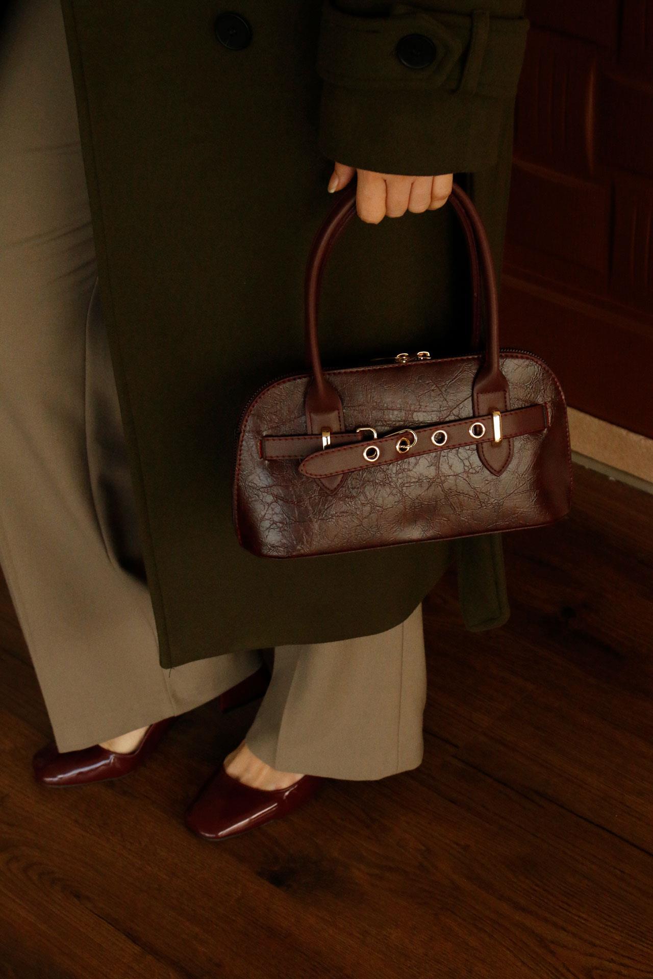 <tc>Sac à main pour femme Timeless en cuir texturé bordeaux</tc>