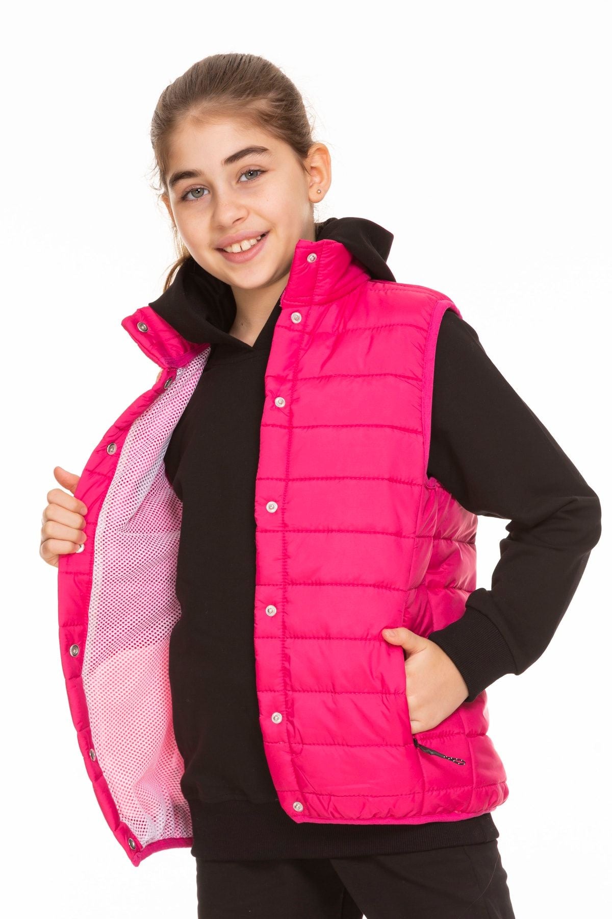 <tc>Gilet unisexe matelassé avec doublure en filet et fermeture à pression</tc>