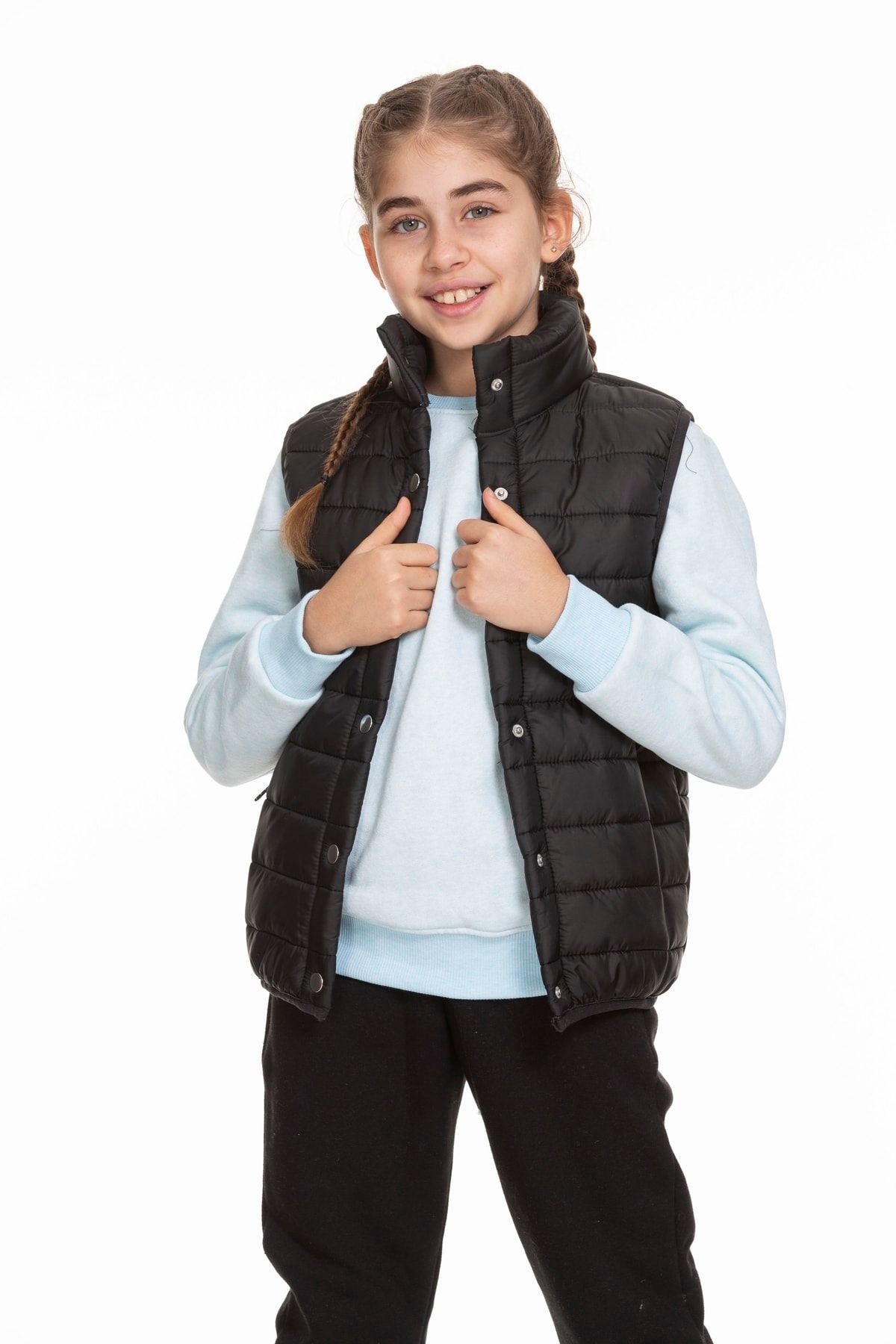 <tc>Gilet unisexe matelassé avec doublure en filet et fermeture à pression</tc>